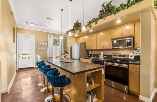 Old East Hill House | Hip & vibrant townhome near downtown with private patio, grill, AC, and WiFi