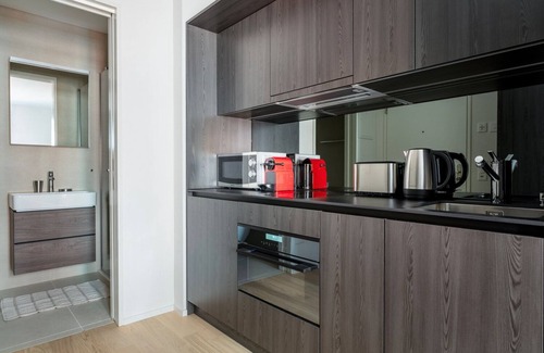Sihlfeld Apartment | Hip Wiedikon 1.5 Room w/Storage & W/D, 1 min to Market, by Blueground