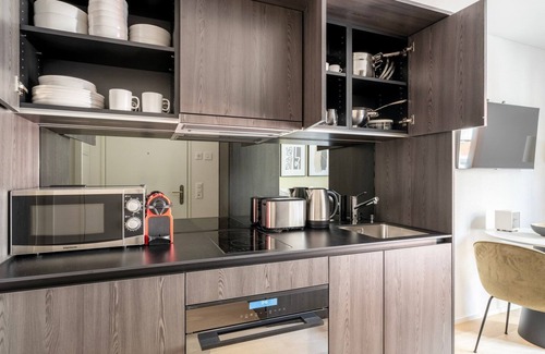 Sihlfeld Apartment | Hip Wiedikon 1.5 Room w/Storage & W/D, 1 min to Market, by Blueground