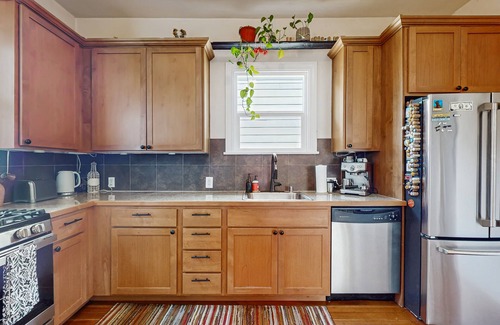 Central District House | Historic 1903 Home with Typewriter Charm & Timeless Soul