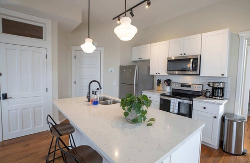 Floyd Apartment | Historic Farmer's Supply- DT Floyd Corner Apt #202