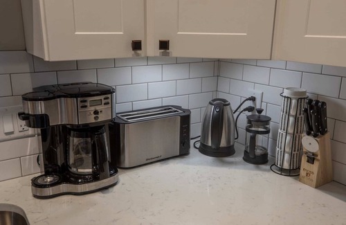 Floyd Apartment | Historic Farmer's Supply Downtown 2bd/1.5bth #203