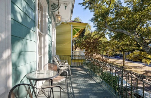 Seventh Ward Apartment | Historic Property With Balcony Lookout into Trees and Pre Civil War buildings.