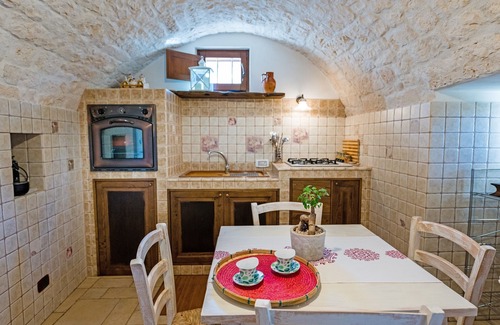 Coreggia Villa | Historic trulli surrounded by ancient olive trees