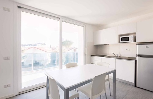 Lignano Sabbiadoro Apartment | Holiday apartment with balcony, air conditioning and internet
