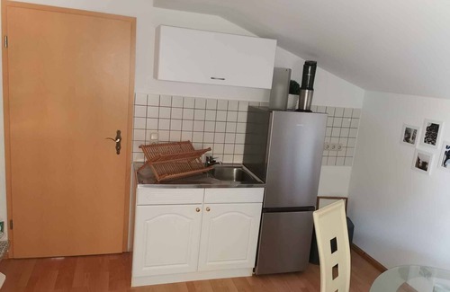 Lietzow Apartment | Holiday apartment with view to the small "Jasmunder Bodden" and patio furniture