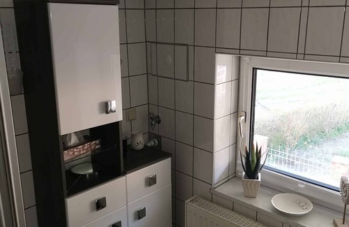 Lietzow Apartment | Holiday apartment with view to the small "Jasmunder Bodden" and patio furniture