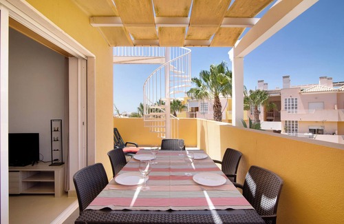 Canada Apartment | Holiday Apartment "Royal Cabanas Golf 89" with Sea View, Shared Pool & Private Terrace