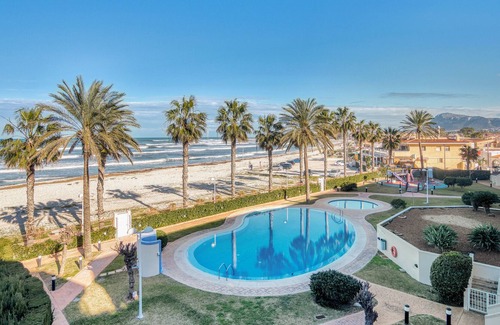 Almadrava Beach Apartment | Holiday Apartment "Beverly Primera Linea De Palya" with Sea View, Shared Pool & Wi-Fi