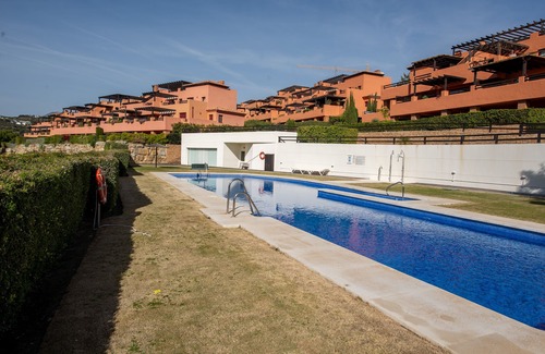 Casares Apartment | Holiday Apartment "Casares Golf Gardens" with Sea View, Shared Pool & Wi-Fi