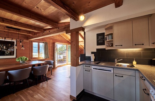 Klosters Dorf Apartment | Holiday Apartment "Dorf" with Mountain View, Balcony & Wi-Fi