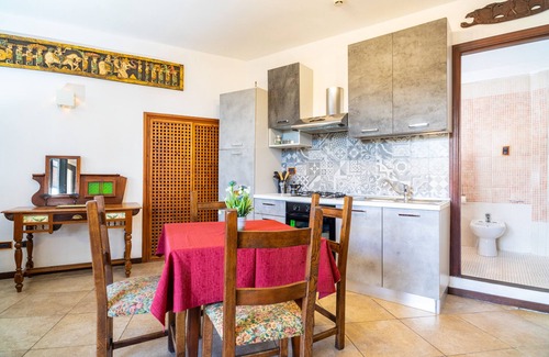 Castelmola Apartment | Holiday Apartment 'Garden Cottage I Dammusi - Ulivo' with Mountain View, Shared Pool & Wi-Fi