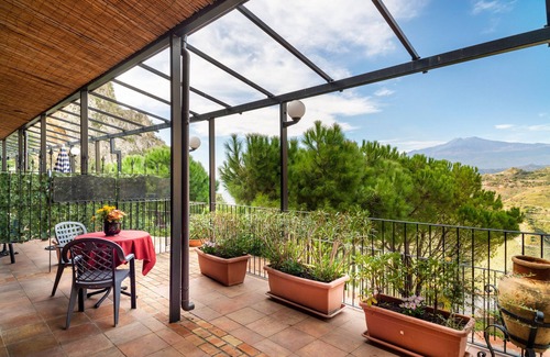 Castelmola Apartment | Holiday Apartment 'Garden Cottage I Dammusi - Ulivo' with Mountain View, Shared Pool & Wi-Fi