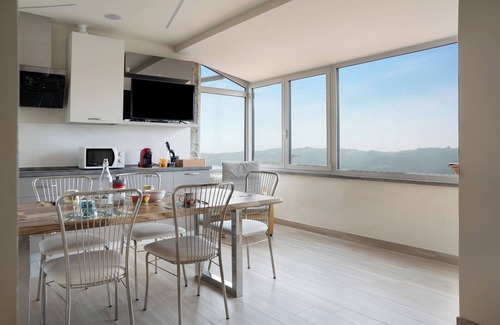Niella Belbo Apartment | Holiday Apartment "Nigella Langhe Home" with Mountain View, Balcony & Wi-Fi