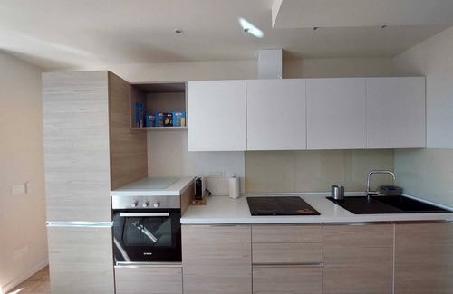 Perledo Apartment | Holiday Apartment "The Panoramic Suite" with Lake View, Shared Pool & Wi-Fi