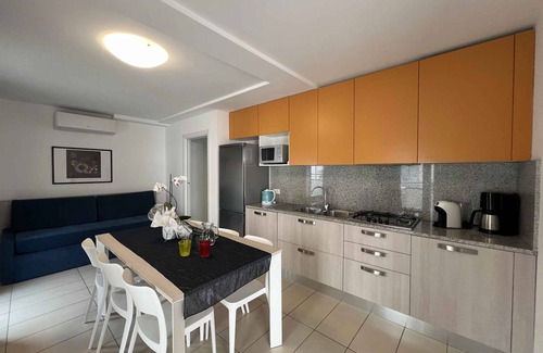 Lignano Sabbiadoro Apartment | Holiday apartment with balcony and air conditioning
