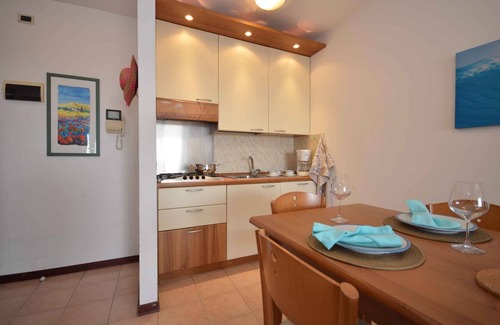 Lignano Sabbiadoro Apartment | Holiday apartment with air conditioning, balcony and roof terrace