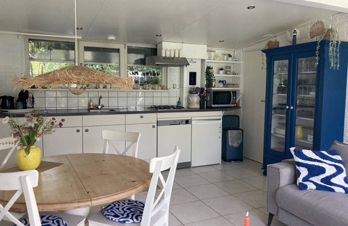 Sint Maartensvlotbrug House | Holiday home De Lavendeltuin in Sint Maartenszee. Suitable for 4 people with 2 bedrooms.