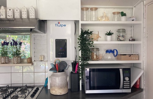Sint Maartensvlotbrug House | Holiday home De Lavendeltuin in Sint Maartenszee. Suitable for 4 people with 2 bedrooms.