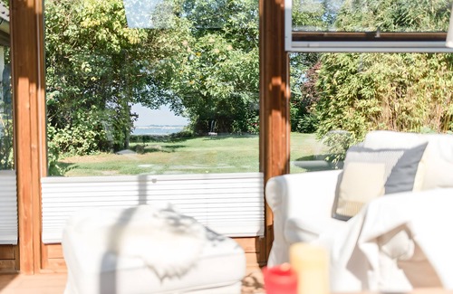 Langballigholz House | Holiday Home 'Am Meer' with Sea View, Private Terrace and Wi-Fi