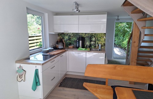 Guestrow House | Holiday Home 'Am Wasser, Bootshaus' with Private Terrace