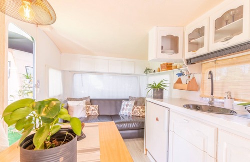 La Nucia RV Rental | Holiday Home "Caravana-Glamping Casa Tortuga" with Mountain View, Shared Pool & Wi-Fi