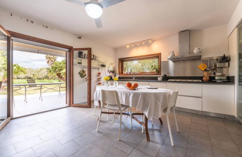 Pula House | Holiday Home 'Casa Peppina Sulla Spiaggia' with Private Terrace, Wi-Fi and Air Conditioning