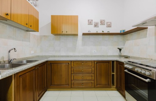 Palmas Arborea House | Holiday Home 'Il Corbezzolo Apartment' with Shared Terrace, Wi-Fi and Air Conditioning