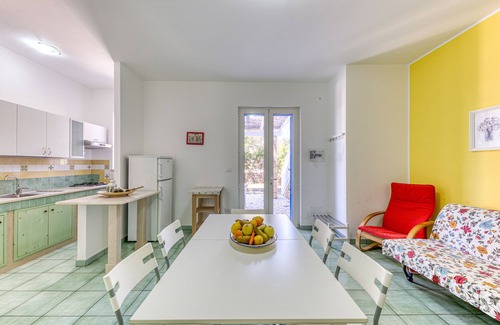 Marina di Novaglie Apartment | Holiday Home 'Il Carrubo Orchide' with Private Terrace, Private Garden and Balcony