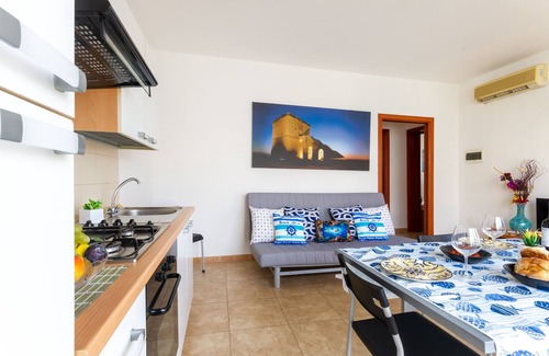 Boncore House | Holiday Home 'Libeccio Luxury Torre Lapillo' with Sea View, Shared Pool and Wi-Fi