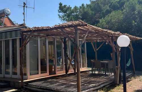 Lacona House | Holiday Home 'Limone' with Private Terrace, Private Garden and Air Conditioning