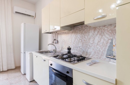 Porto Cesareo House | Holiday Home 'Monolocale Sapore Di Mare' with Sea View, Wi-Fi and Air Conditioning