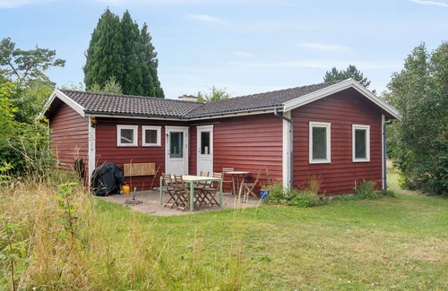 Faarevejle House | Holiday home on adventurous plot near beach