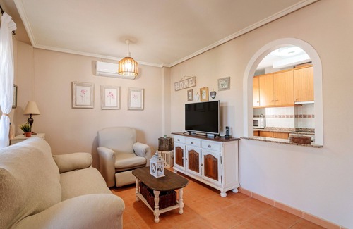 Los Arenales del Sol House | Holiday Home 'Playa Carabassi' with Shared Pool, Private Terrace and Wi-Fi