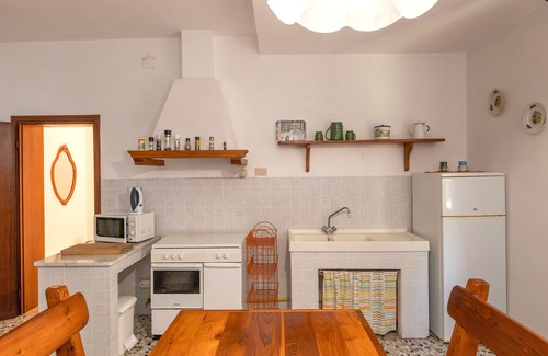 Fauglia House | Holiday Home 'Poggio1' with Shared Pool, Shared Garden and Wi-Fi