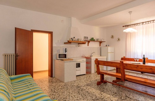 Fauglia House | Holiday Home 'Poggio1' with Shared Pool, Shared Garden and Wi-Fi