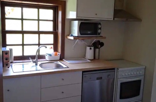 Beijos House | Holiday Home 'Casa De Andrães Magnolias' with Shared Pool, Wi-Fi and Air Conditioning