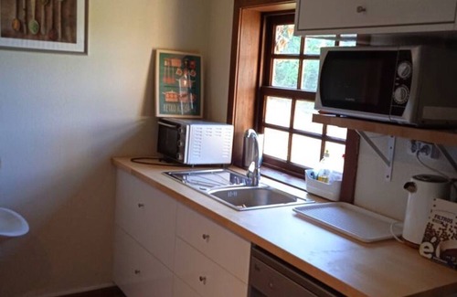 Beijos House | Holiday Home 'Casa De Andrães Magnolias' with Shared Pool, Wi-Fi and Air Conditioning