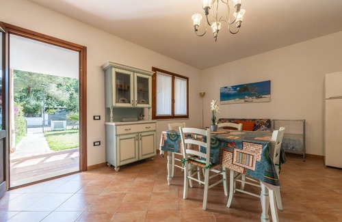 Porto Pino House | Holiday Home 'Sole E Mare' with Private Terrace, Private Garden and Air Conditioning