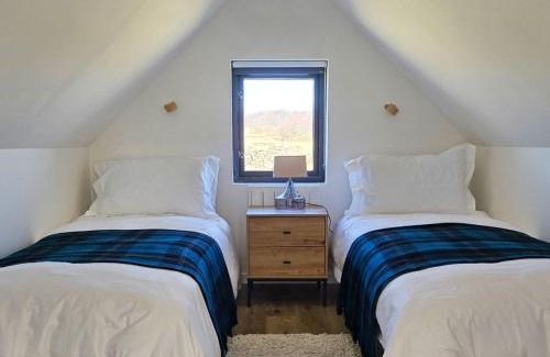Breakish House | Holiday Home The Longhouse by Interhome