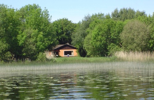 Woodford House | Holiday home with boat, romantically located between sea and moor