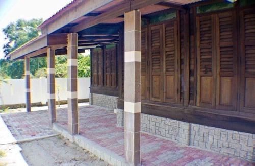Lubok Buaya House | Holiday house in traditional wooden construction with massive cultivation