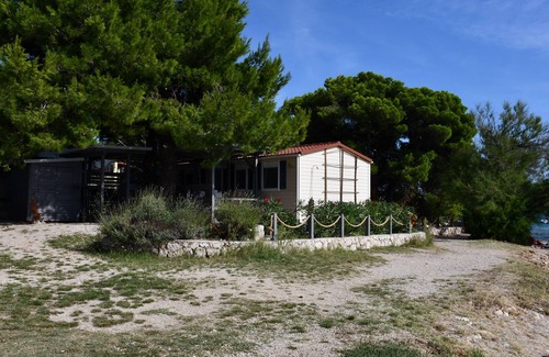 Pirovac House | Holiday house/mobile home in the 1. Line seafront, 34 m² + 24 m² terrace