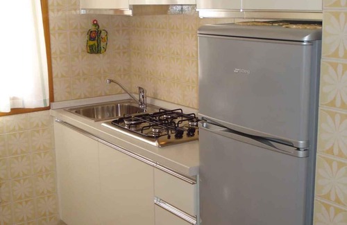 Porto Santa Margherita Apartment | Holiday apartment with garden and microwave