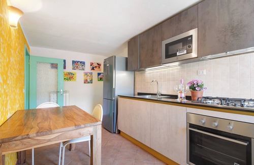 San Colombano Certenoli Apartment | Holiday Apartment 'La Fermenteria' with Mountain View, Shared Garden & Wi-Fi