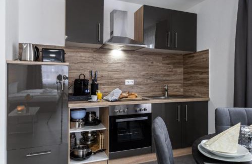 Weingarten Apartment | Holiday&Stay, Apartment Relax, Küche, 85Zoll TV, WLAN