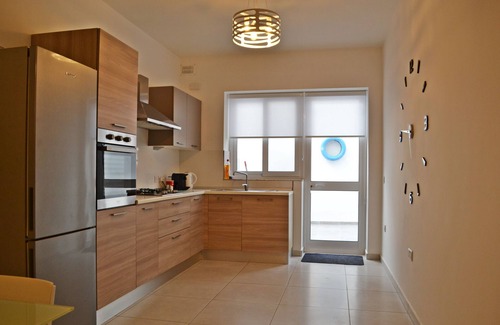 Marsaxlokk Apartment | Home a few meters from promenade, restaurants, beach, bus stop & parking.