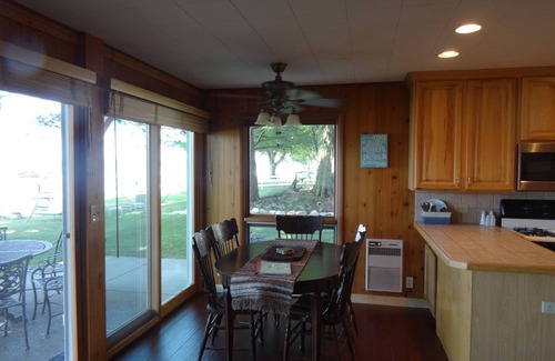 Mears Cottage | Home on the lake. Walk out your door for Swimming, boating or morning coffee.
