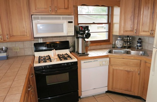 Mears Cottage | Home on the lake. Walk out your door for Swimming, boating or morning coffee.