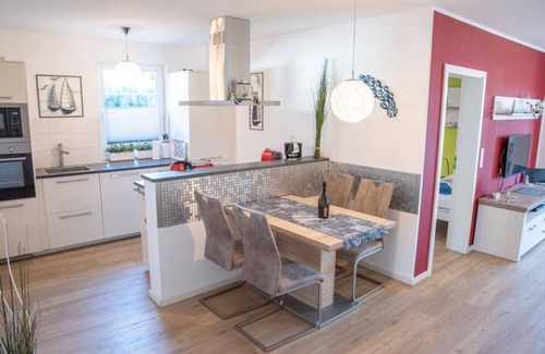 Born auf dem Darss Apartment | @Home - sun terrace, barbecue, dogs allowed, sauna, close to the Bodden, Baltic Sea 6km away, washing machine, WLAN